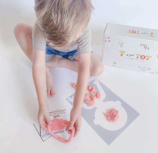 Child playing with T Is For Tot Human Body STEM activity