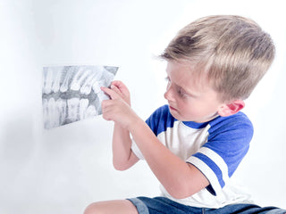 Preschooler using hands on learning activity