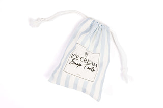 Drawstring bag holding ice cream science tools for preschool hands-on learning