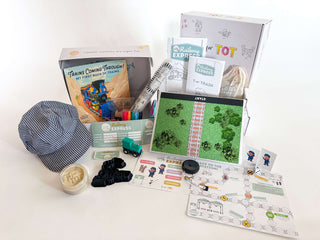 T is for Train Kit includes a book, game board, toy train, markers, and accessories for creative learning.