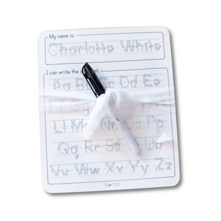 Personalized dry erase name and alphabet board with a black marker for kids learning.