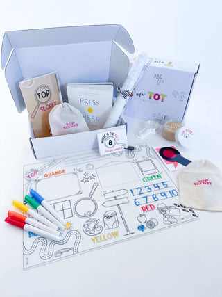 Learn and Play Kit subscription box with creative activities, markers, and educational materials for toddlers.