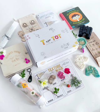 Learn and Play Kit contents including educational materials, nature items, and creative tools for toddlers.