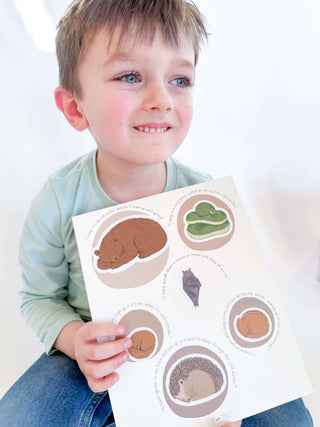 Reusable hibernation-themed stickers and interactive poster for learning about bear habitats