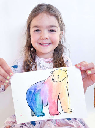 Preschooler conducting science experiments from T is for Tot