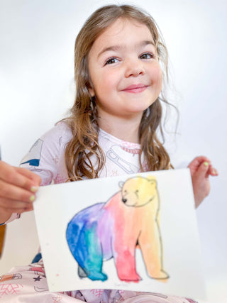 Preschooler conducting science experiments from T is for Tot