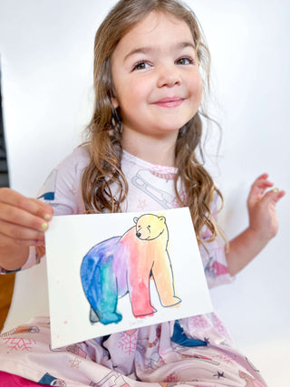 Preschooler conducting science experiments from T is for Tot