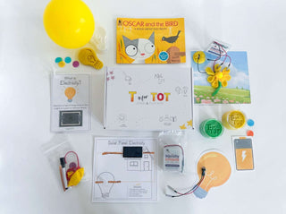 Interactive electricity learning kit for kids, featuring Squishy Circuits battery pack, homemade playdough, and lightbulb playdough cutter. Includes experiments with static electricity and solar panels, along with