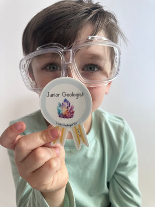 Young child playing with Geologist Learn & Play Kit