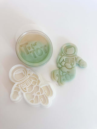 Homemade non-toxic playdough with astronaut cutter, developing fine motor skills