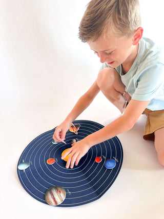 Child engaging with T is for Tot