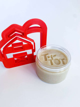 On the Farm Kit homemade non-toxic playdough and barn cutter enhancing early childhood fine motor development.