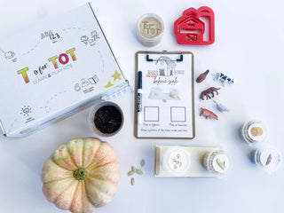 Interactive farm play kit for children with non-toxic playdough, barn playdough cutter, and a playdough farm mat. Includes farm animals, a balance scale, and a Grow Your Own Pumpkin kit. Comes with