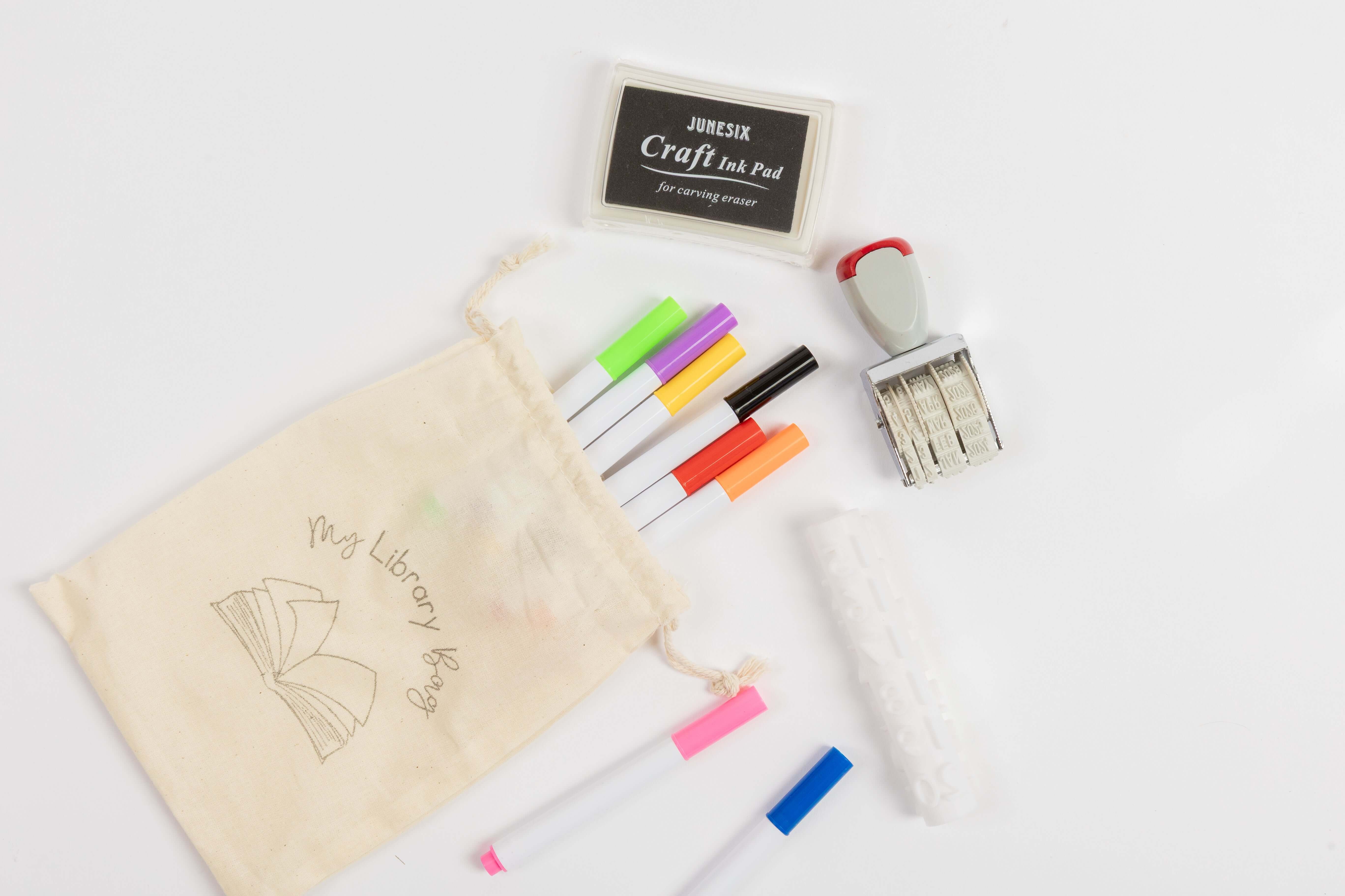 Library card with date stamp and ink pad for preschool pretend play and early literacy