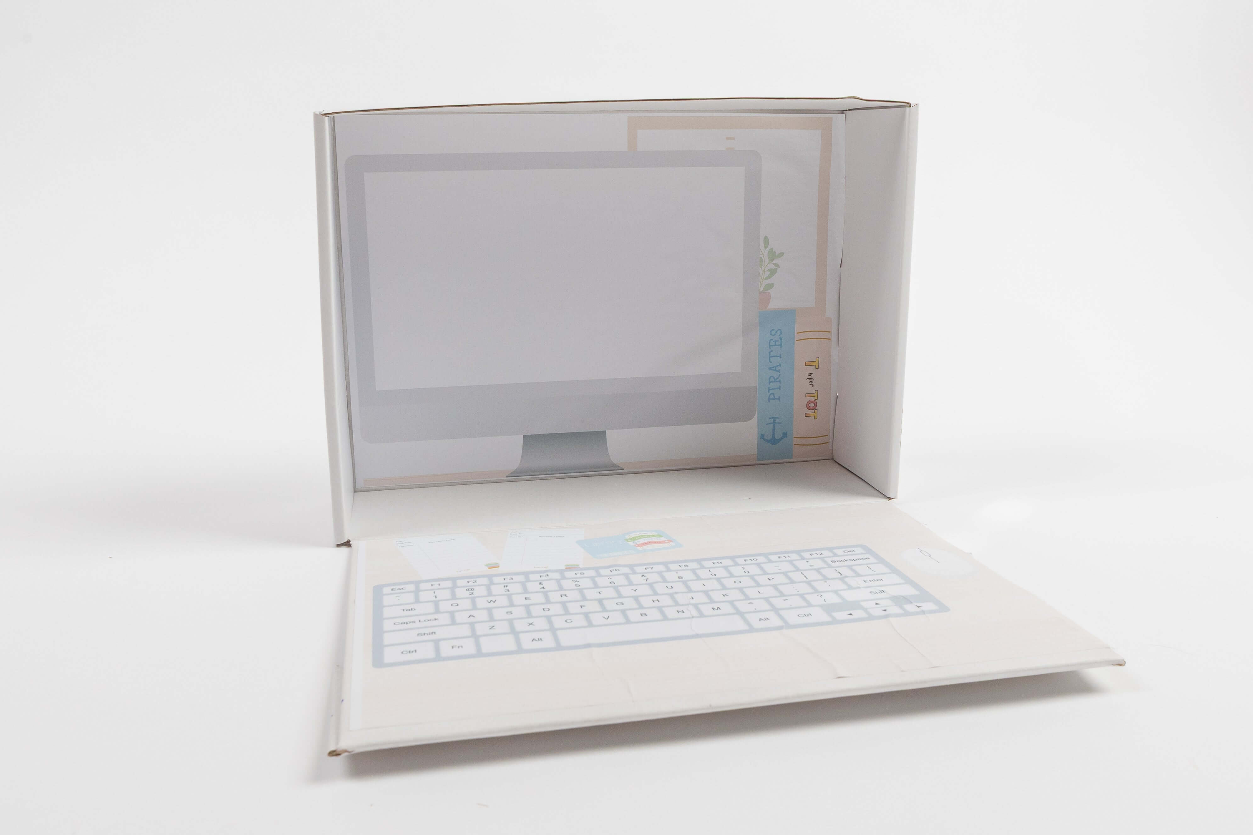 Pretend play computer encouraging preschool role-play and early literacy activities