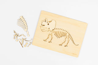 Chunky wooden dinosaur puzzle supporting preschool fine motor and problem-solving skills