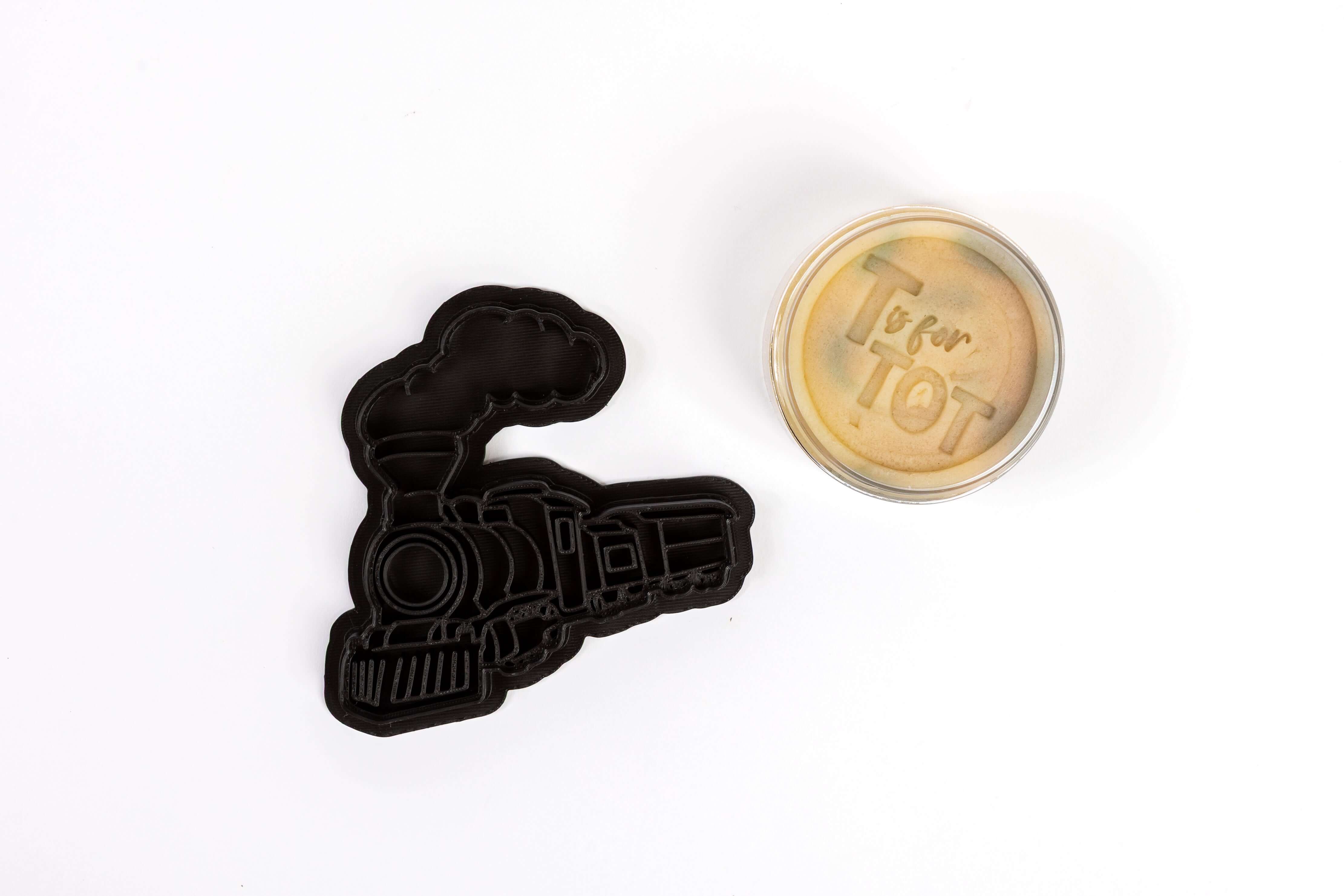 Train playdough activity supporting preschool fine motor development and creativity