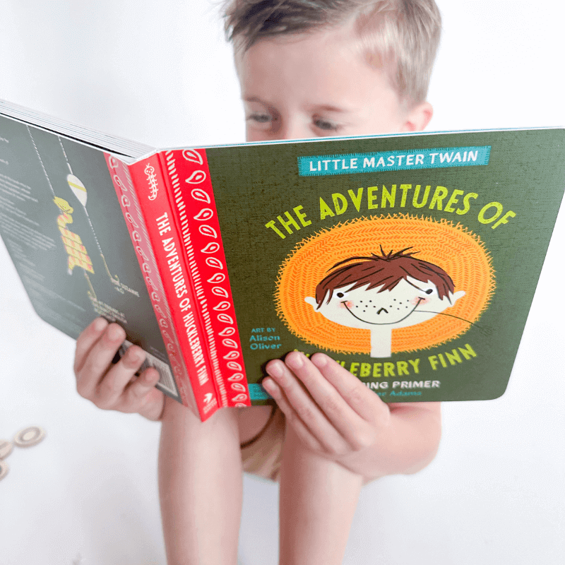 Child reading an educational book