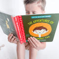 Child reading an educational book
