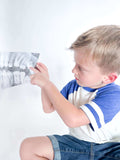 Interactive Community Helpers play kit for children aged 3-6. Includes fire engine playdough cutter, homemade playdough, dental x-rays, Clothesline Clues book, and a dice teeth game for educational fun.