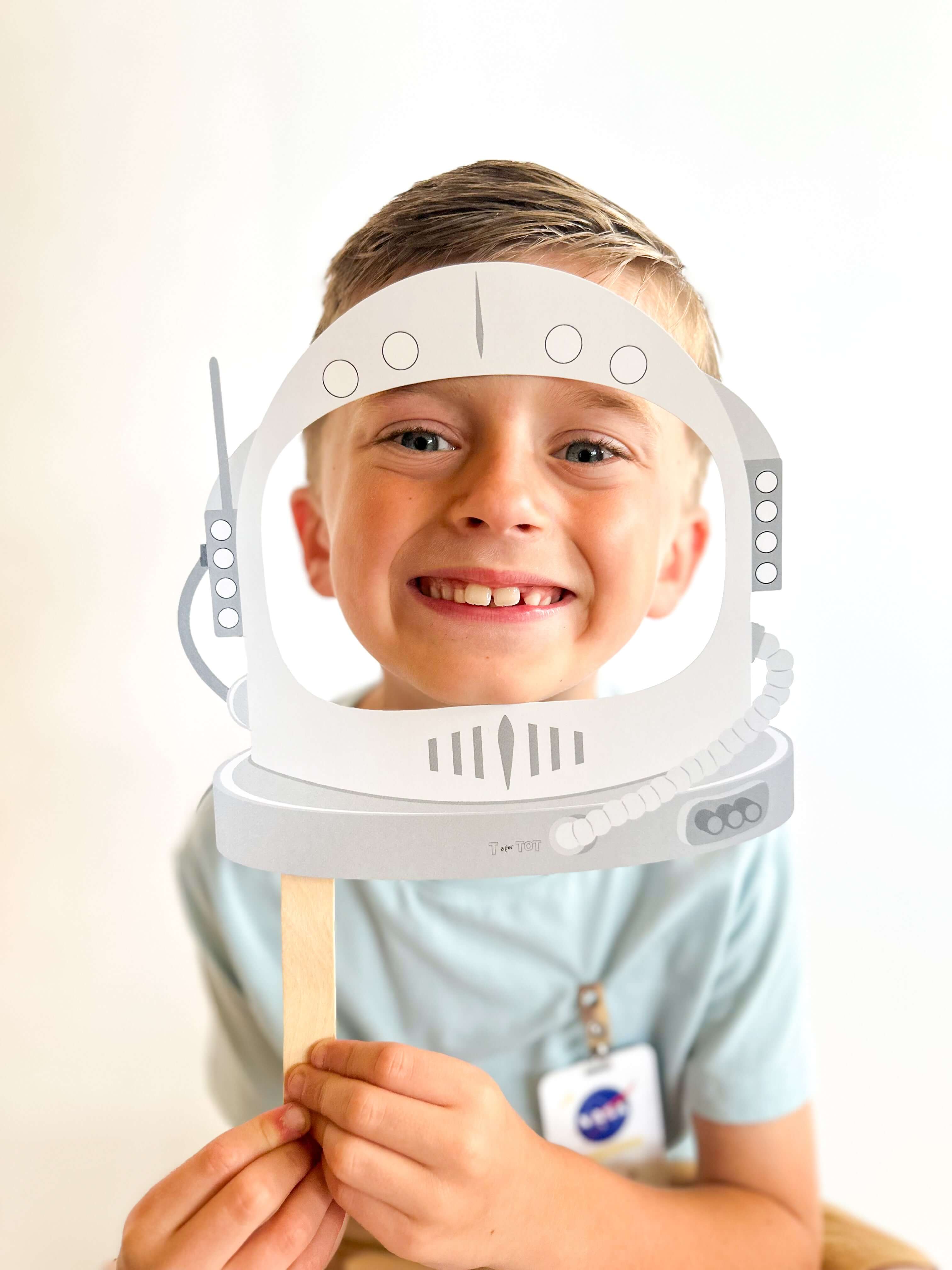 Child engaging with T is for Tot